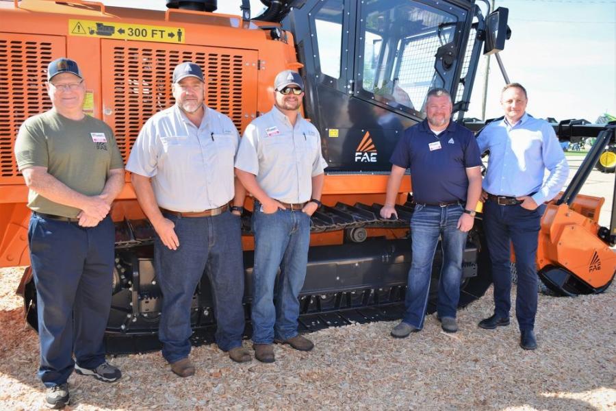 At the heart of the FAE display was an FAE PT-300 tracked forestry mulcher and staffers out promoting the machine and other attachments. (L-R) are Chris Koch, Lee Smith, John Keeney, Chad Florian and Giorgio Carera.
