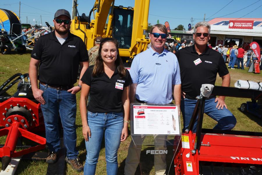 Keeping busy promoting the Fecon line-up of mulchers were (L-R) Doug Mace and Amelia Reynolds of Fecon; Scott Burson of Tractor & Equipment Co. – Albany, Ga.; and Bob Candee, also of Fecon. 
