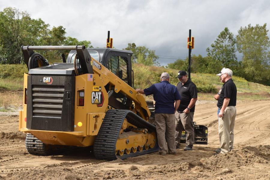 A Cat 299D3 compact tracked loader equipped with Trimble 2D Laser guided   technology demonstrated with the assistance of representatives from H.O. Penn and Sitech Metro Northeast.