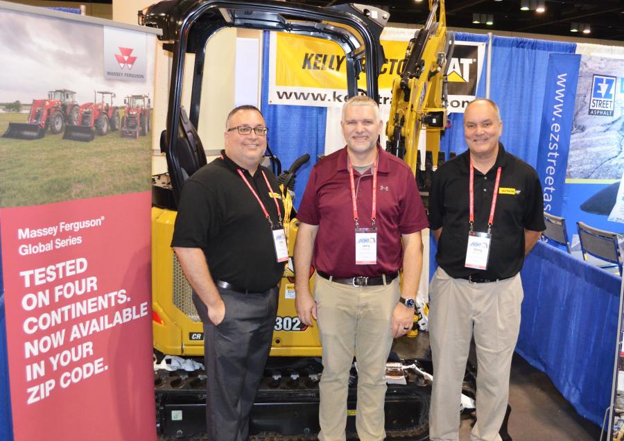 Promoting the Caterpillar 302 mini-excavator, Massey Ferguson tractors and much, much more (L-R) are John Soto, Jerry Stewart and Greg Bennett of Kelly Tractor, Miami, Fla.