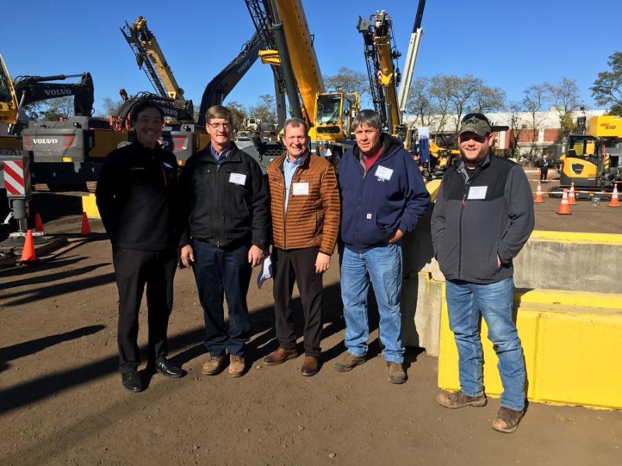 Meeting up for a photo op during the Hoffman Equipment open house (L-R) are Ion Warner, vice president of marketing and investor relations, Manitowoc Group; Glenn Ely, PKF-Mark III Inc.; Tim Watters, president of Hoffman Equipment; John Dengel, Construction & Marine Equipment Co.; and Zack Nyce, PKF-Mark III Inc.