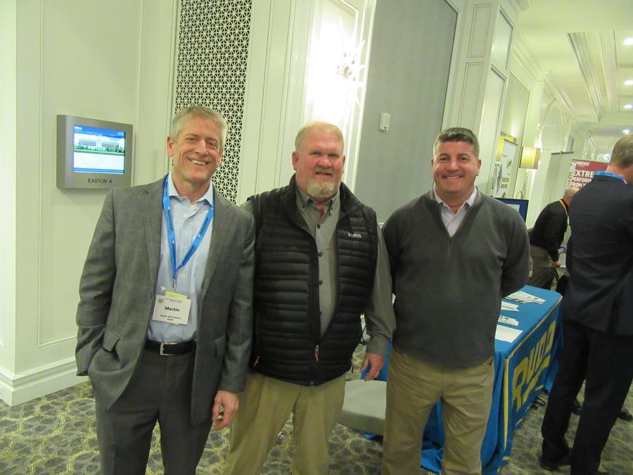 (L-R): Rudd Equipment Company’s Martin McCutcheon, Josh Poston and Brian James welcomed attendees during the exhibitor reception.