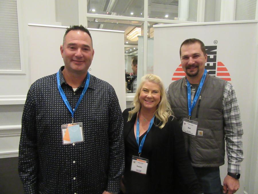 (L-R): AGGCORP’s Roberto Arnbruster and Sue Vitaz caught up with Jon Stock from Tiger Sand and Gravel during the reception.