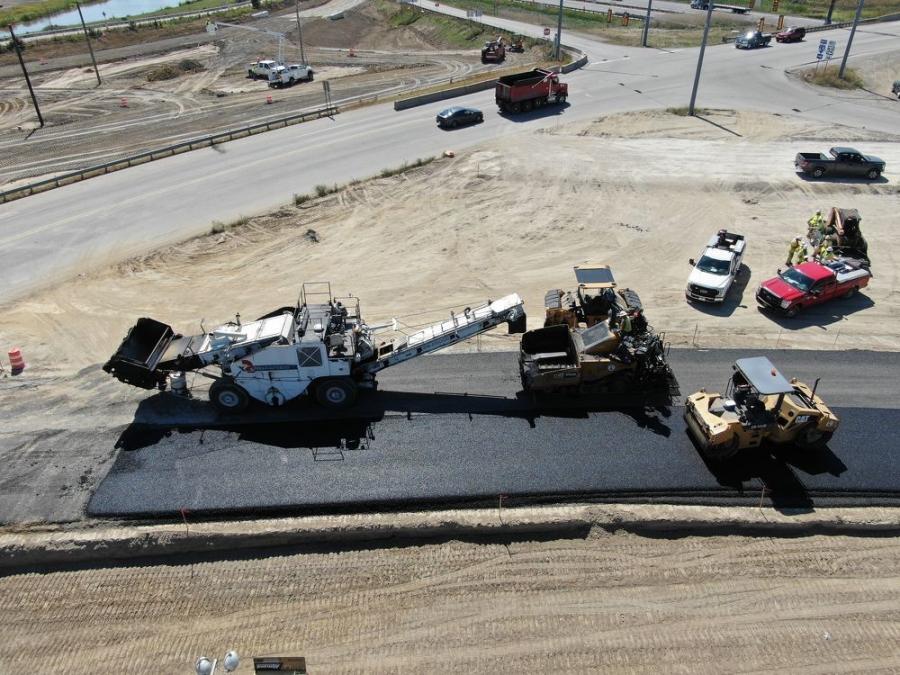 Approximately 150,000 tons of asphalt is being used on the project. It comes from the E&B Paving plant at Harding Street.
(INDOT photo)