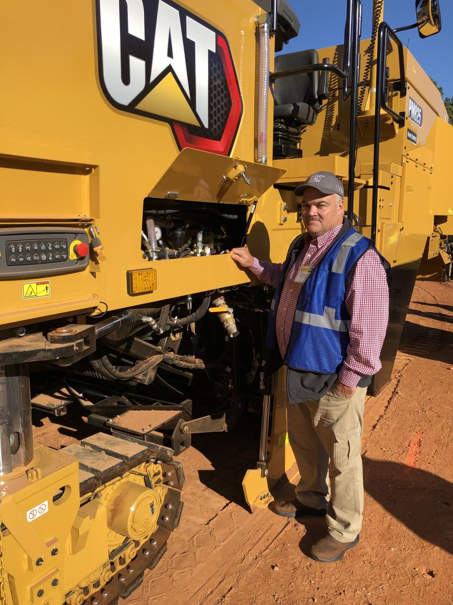 Billy Martin of Talley Construction in Chattanooga, Tenn., checks out his latest investment, the Cat PM825.