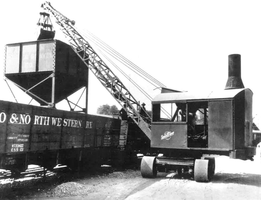 A Moore Brothers Speedcrane, ancestor to the Manitowoc crane line of today, charges a hopper 
that in turn loads gondola cars.
(Bob Walkner, HCEA Archives photo) 