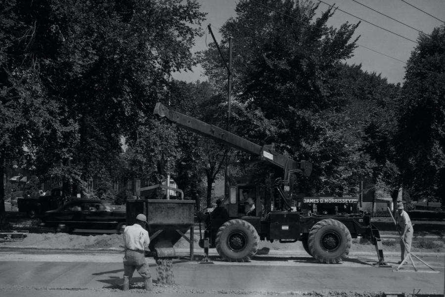 In 1957, an Austin-Western self-propelled hydraulic crane is being used by James D. Morrissey Inc. to place concrete on Roosevelt Blvd.  in Philadelphia in odd places a dry batch paver couldn’t reach. 
(Austin-Western Road Machinery Company image, HCEA Archives photo)