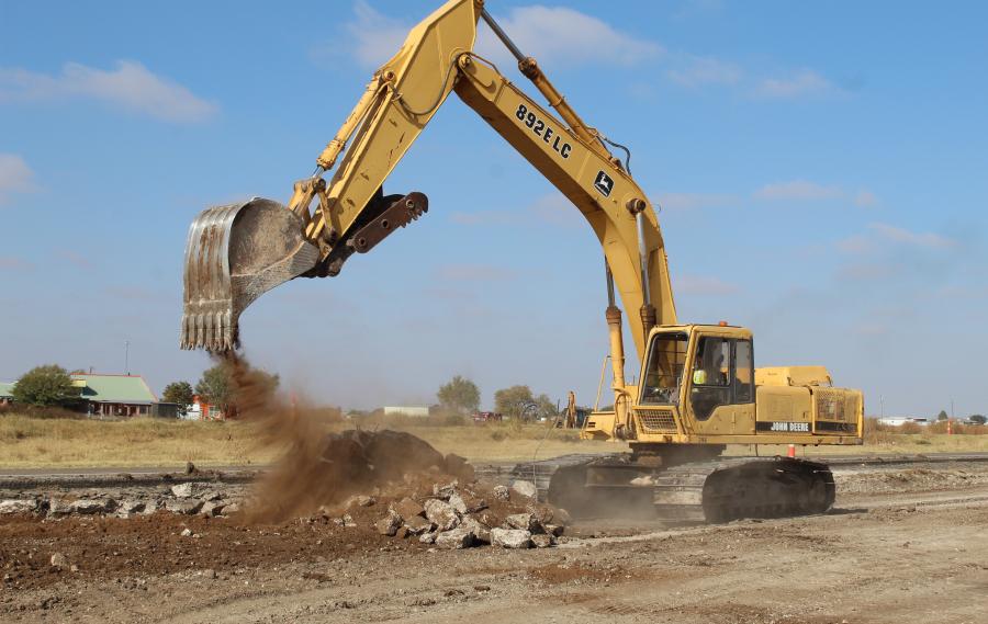 Allen Butler Construction Inc. crews demo a portion of the existing northbound U.S. 87 mainlane utilizing a John Deere 892 LC hydraulic excavator. The roadway’s frontage roads will be constructed during Phase 1 of the project.