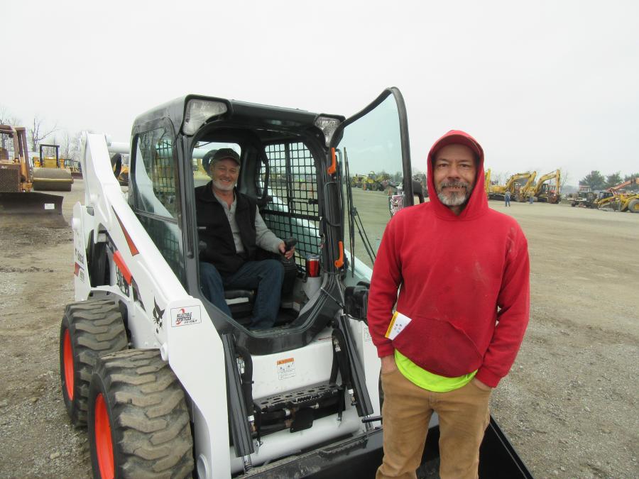 Earl Brumley (L) of Earl’s Tree Service was joined by David Hawk to review this Bobcat S570 skid steer loader.
