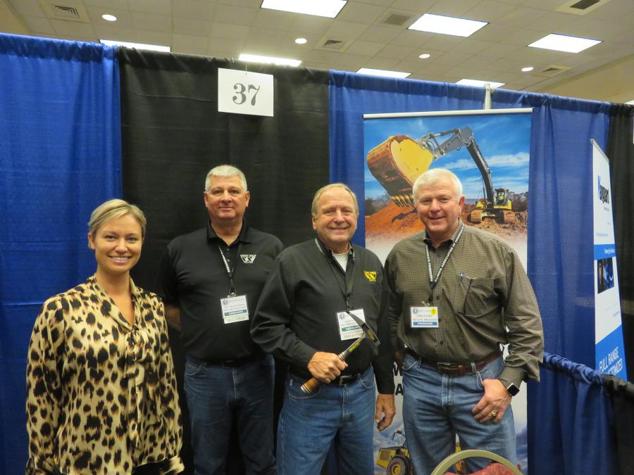 (L-R) are Meghan Hargrave, sales manager of West Side Tractor Sales; Tate Van Overmeiren of West Side Tractor Sales; Ron Svartoien of West Side Tractor Sales; and John Lichty of Beverly Materials. Svartoien is celebrating 50 years of serving customers at West Side Tractor Sales. 
