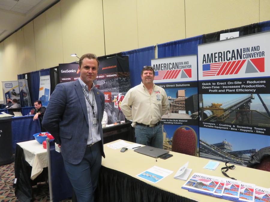Elliot Archibald (L) of Supreme Manufacturing talks with Mark Rademaker, president of American Bin and Conveyor.
