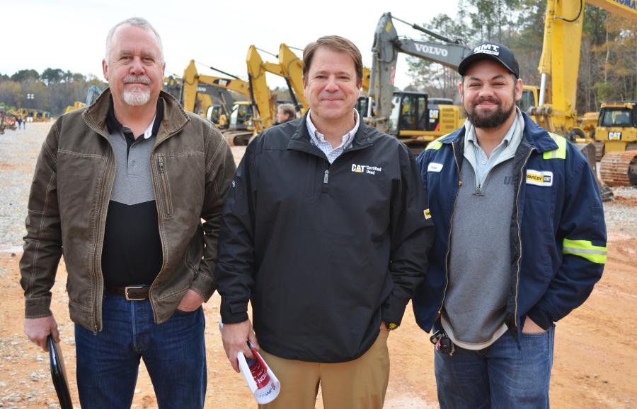 Alabama and Georgia Caterpillar dealer representatives were out looking over the late-model equipment and monitoring the pricing. (L-R) are Tim Murphy, Yancey Bros. Co.; Greg Frost, Thompson Tractor Company; and Calum Mcloughlin, Yancey Bros. Co. 
