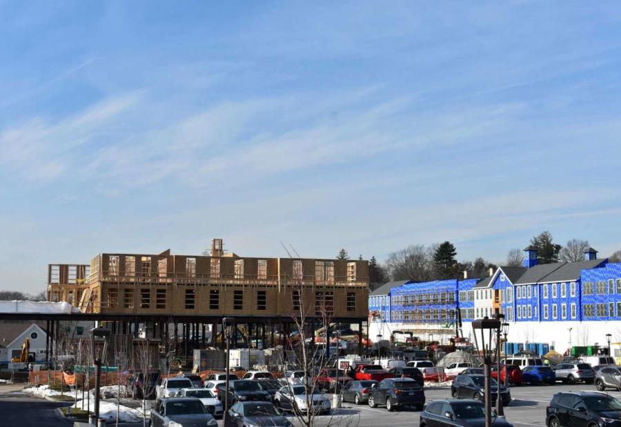 The two main buildings of Darien Crossing under construction in mid-January 2022 in Darien, Conn., with the development to include as many as two-dozen shops across from the Noroton stop of the Metro North commuter rail line. (Alexander Soule/Hearst Connecticut Media photo)