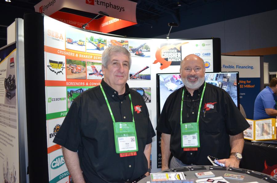 Rick Cohen (L) and Thomas Barry, both of GrinderCrusherScreen, are ready to speak with prospective new dealers. GrinderCrusherScreen was among the first-time CONDEX manufacturer exhibitors.