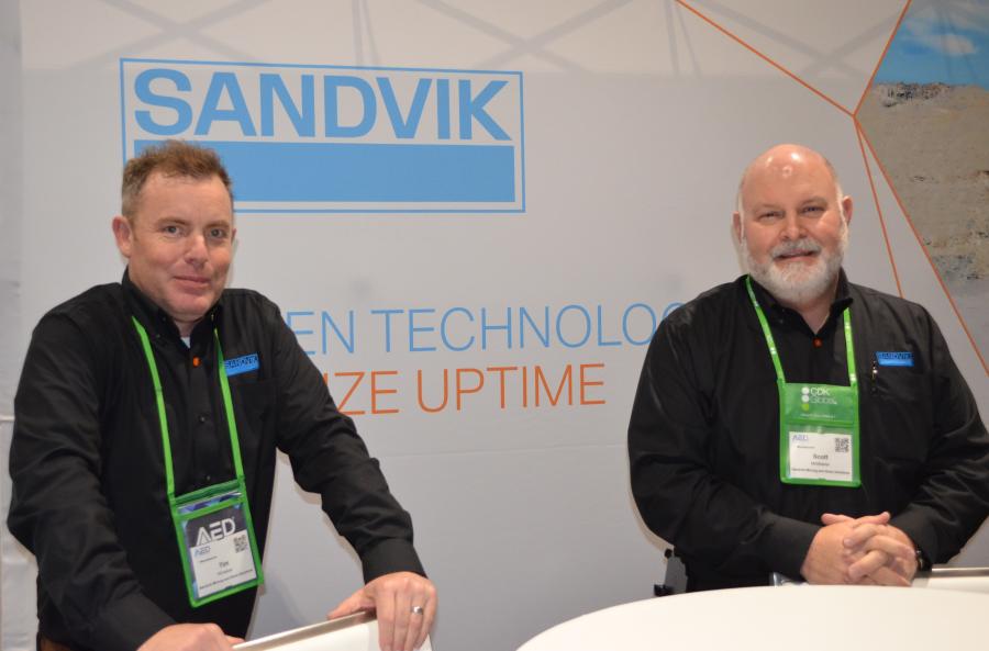 Representatives of Sandvik Mining & Rock Solutions included Tim Winslow (L) and Scott McMaster. Both were keeping their dealers well informed of the company’s latest product innovations. 