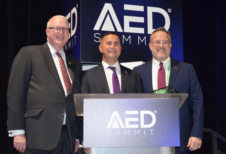 Amidst the backdrop of the AED Summit & CONDEX, a major conference and trade show highlighted that the greater Orlando area was open for business, Congressman Darren Soto (D-Fla.) joined AED senior leadership to discuss the bipartisan infrastructure law’s positive impact on the federal, state and local levels and the broader equipment industry. (L-R) are AED President and CEO Brian McGuire, Congressman Darren Soto and incoming AED Chairman Ken Taylor of Ohio CAT.