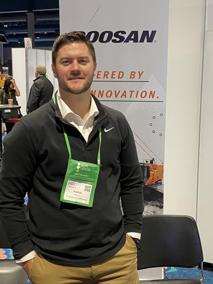 Patrick Storey of Doosan Infracore scans the AED crowd looking for a small handful of key dealers to fill a couple of open territories in North America.