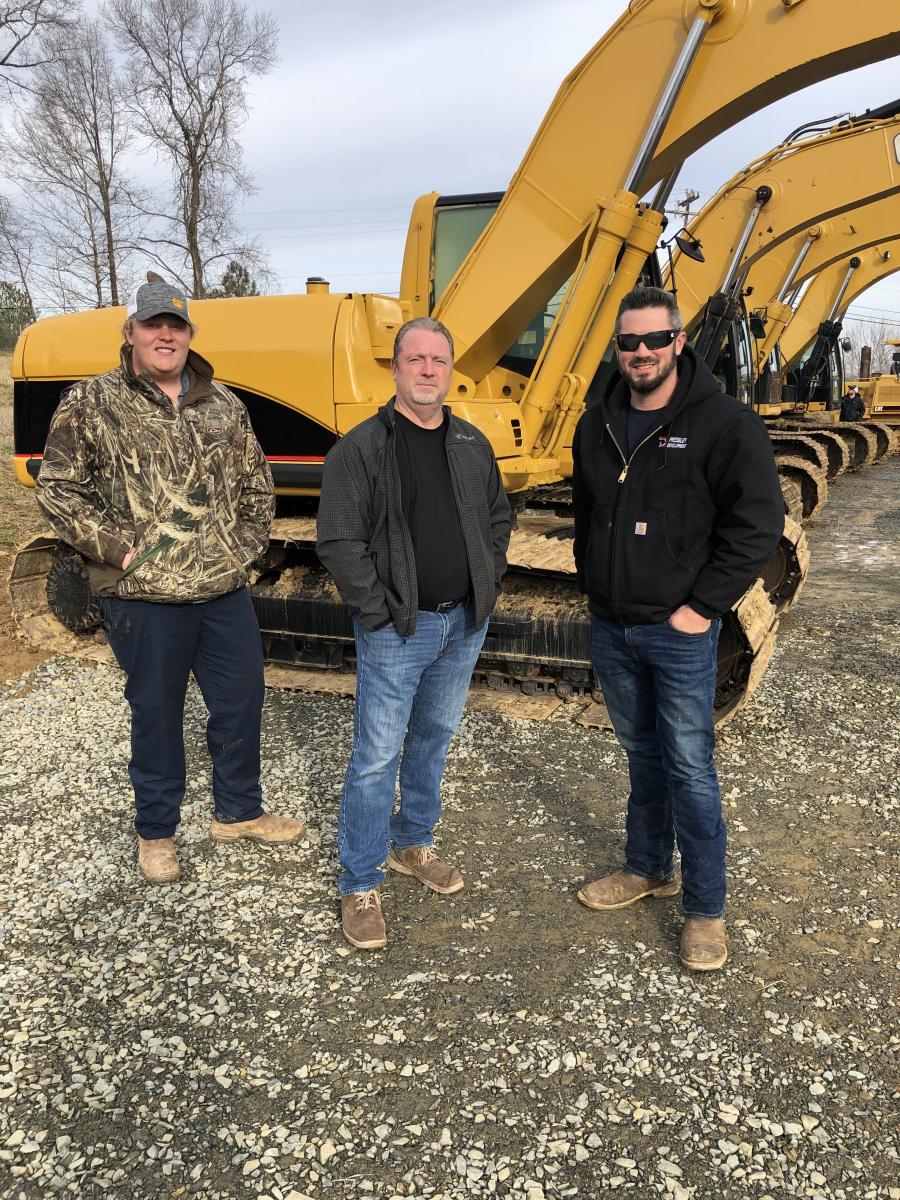 (L-R): Cat excavators caught the attention of Lauson Purser, LB Purser Grading in Midland, N.C.; and Kevin and Jake Pressley of Pressley Development in Hemby Bridge, N.C.
