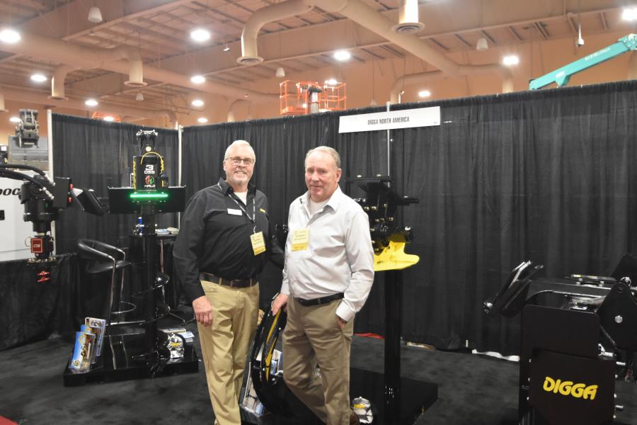 Lance Smeins (L) and Neil Edmonds of Digga North America showed what Digga can provide for drilling and anchoring solutions for skid steer loaders, excavators up to 90 ton, truck cranes, backhoes, telehandlers, tractors and mini loaders.