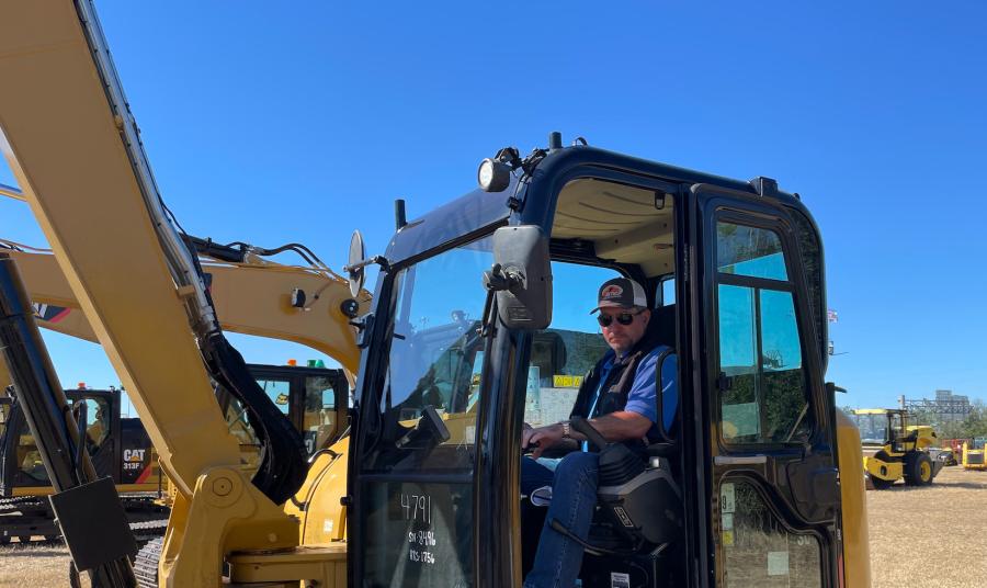 Craig Albritton, president of Artec Tractor and Equipment in Jasper, Ala., was in the driver’s seat of a Caterpillar excavator. 