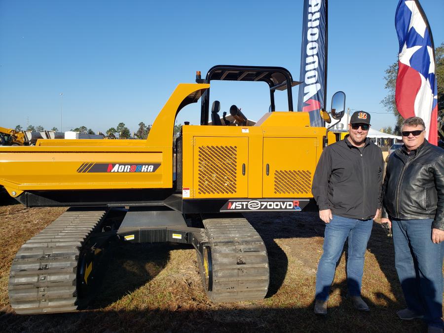 Adam Brown (L) of Newman Tractor in Richwood, Ky., discusses this Morooka MST700VDR all-terrain tracked carrier with Ken Byrd, president of Morooka USA.