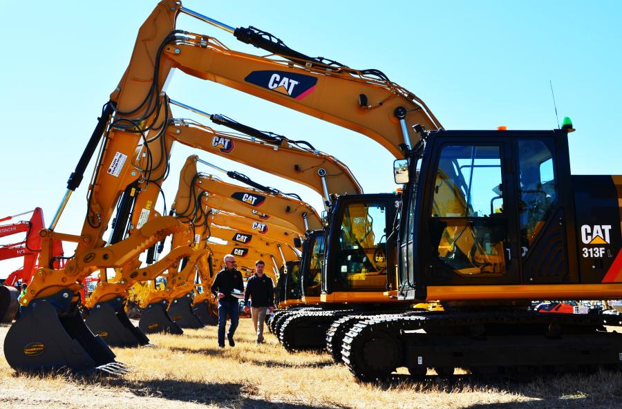 Late model mid-sized Cat excavators were of interest to this duo of machine buyers.