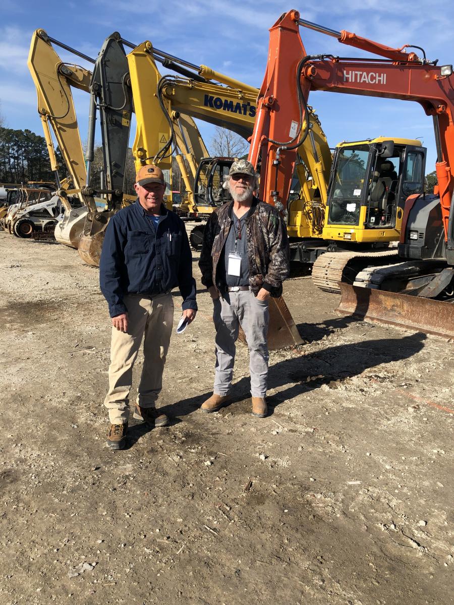 Jenkins Montgomery (L) of Montgomery Contracting in Charleston and Mark Berry of Berry Demolition, also in Charleston, were both interested in the excavators.