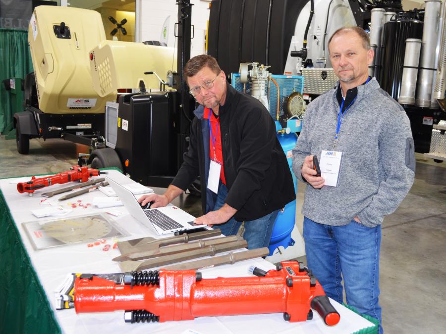 Doing their final early morning booth set up of various manufacturers tooling, including Doosan Portable Power products, are Ron Key (L) and Terry Jackson of Air Compressor Sales Inc.
