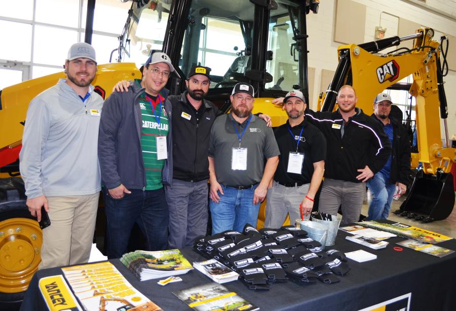 Representing and discussing the Cat products at the Yancey Bros. Co. display were (L-R) Tyler Ward, Blake Wittenberg, Trey Duke, Chad Skinner, Landon Holcombe, Nick Bova and Robert Rogers. 