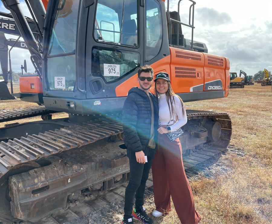 Jorge Jara and Gerri Lopera came all the way from Colombia, South America, and were looking over this Doosan DX350LC excavator. 