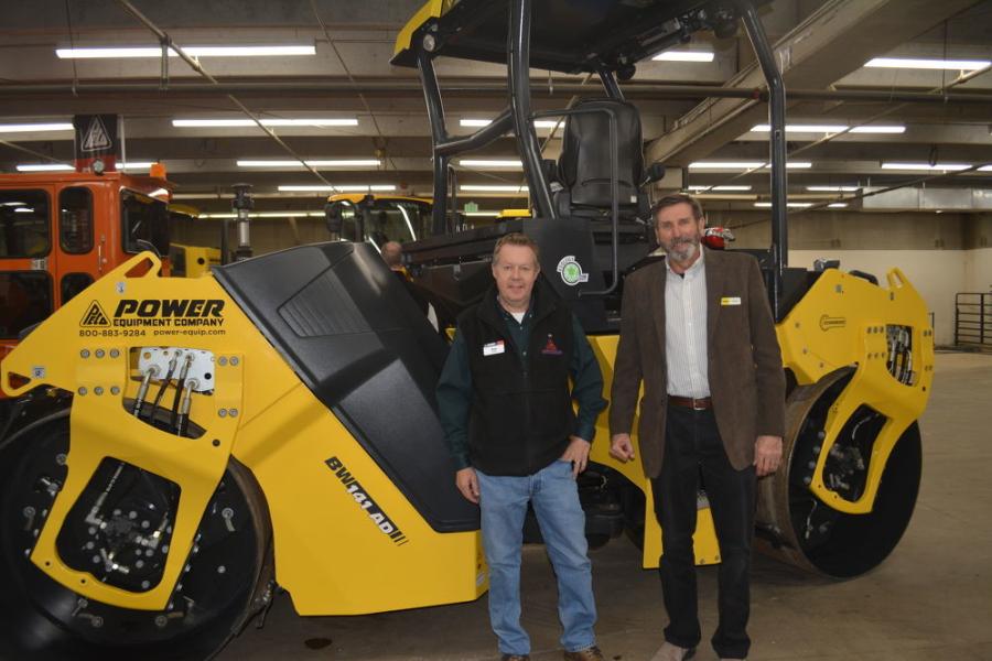 Power Equipment Company’s Doug Corley (L) and Bill Stalzer of Bomag presented the Bomag BW 141-AD tandem roller to contractors at the Denver show, along with milling machines and paving equipment offered by the longtime Denver Volvo dealer.