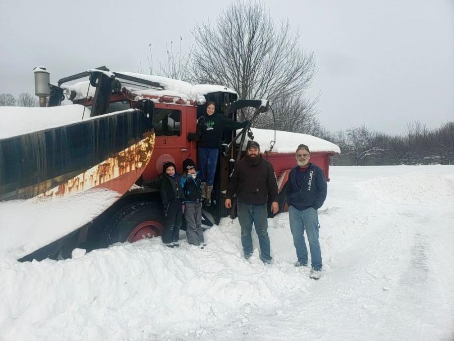 The Dutch family poses with the 1963 Walter snow truck. (L-R): Ryan’s children, Ziggy (named after his grandfather Zigmont), Evangeline, Avery and Ryan; and Ken Dutch.