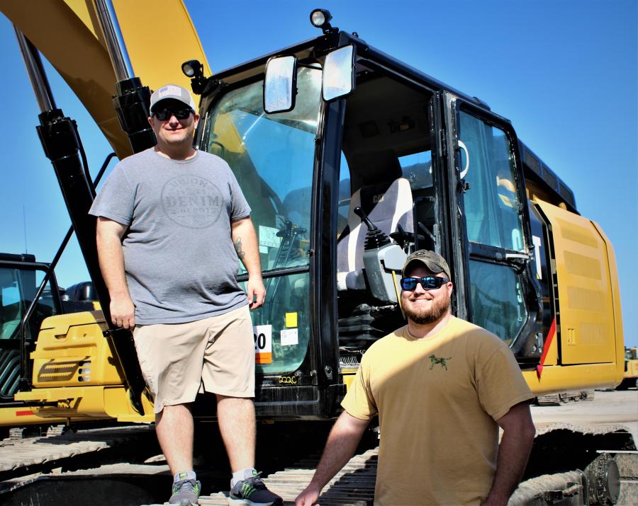 Down from Richmond, Va., are Jeff Stech and Tyler Suttenfield of Shoosmith Construction. The two were on the “dueling Cats” checking out hydraulic flow speed and control response.