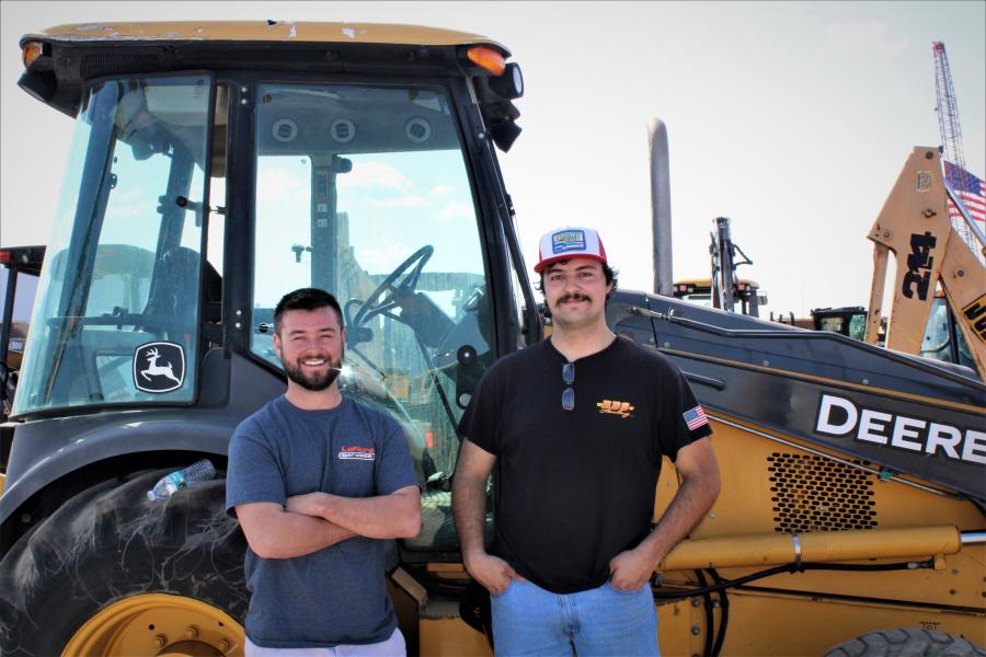 Nicolas Coston, an owner of Coston and Sons Excavating, with employee Paul Williams, were looking through the options for backhoes to bring back home to Franklin, N.J.