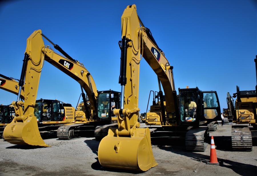 A pair of Cat excavators are ready to duel it out for new owners. 

