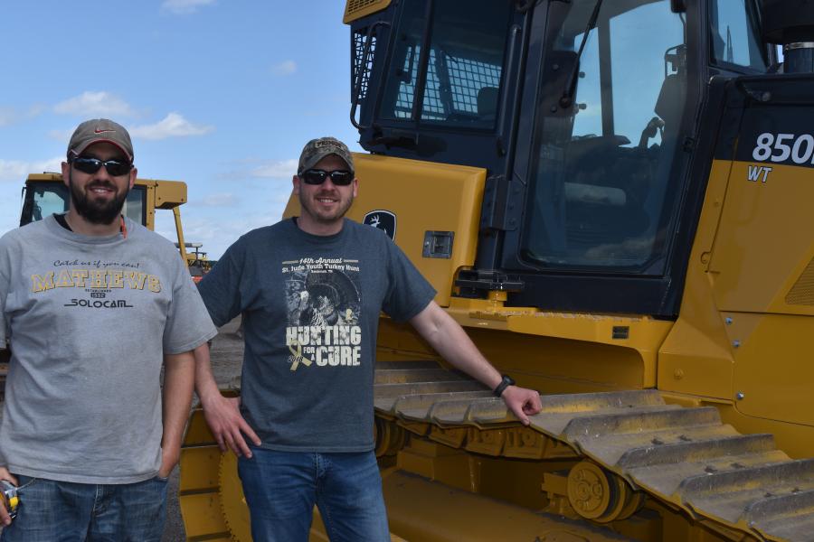 Dean Construction of Smethport, Pa., has a long history of purchasing John Deere construction equipment like this John Deere 850K  from Ritchie Bros. Corey Dean (L) and  Craig Dean, owners of Dean Construction.