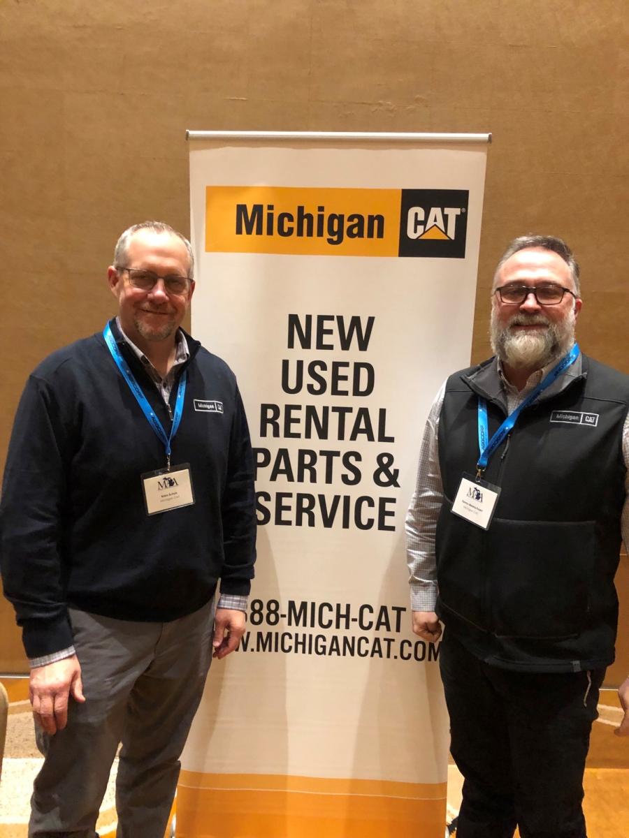 Doug Needham (L), Michigan Aggregates Association president, catches up with Elliot Archibald of Supreme Manufacturing. 
