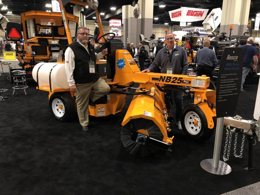 Doug Thompson (L) of LeeBoy and Mike Brunson of Roland Machinery in Springfield, Ill., with the NB25, LeeBoy’s three-wheeled self-propelled sweeper.