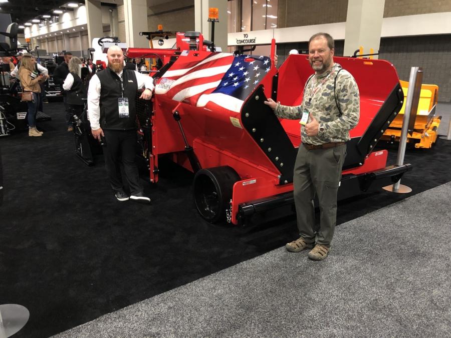 Ed Ford (L) of LeeBoy showed Martin Steed of Steed Paving in Aiken, S.C., the paver that was specially painted for Seminole Paving in Orlando, Fla.