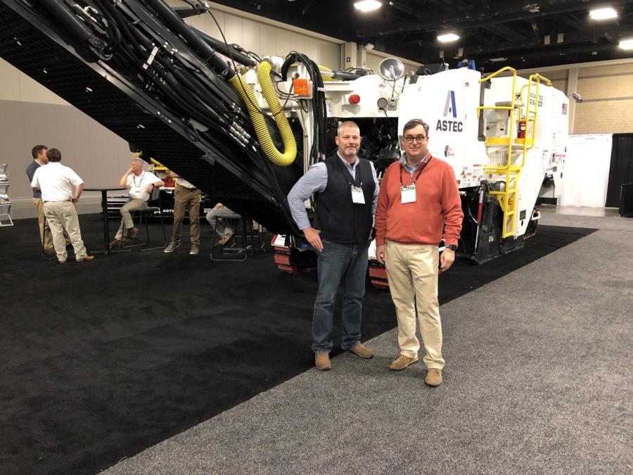 Brian Gray (L) of Astec and Jim Hills of Hills Machinery, the Astec dealer of the Carolinas, are in front of the Roadtec RX-505 cold planer. The RX-505 incorporates high-function conveyors as well as automated controls for rpm, water, elevation, load and traction.
