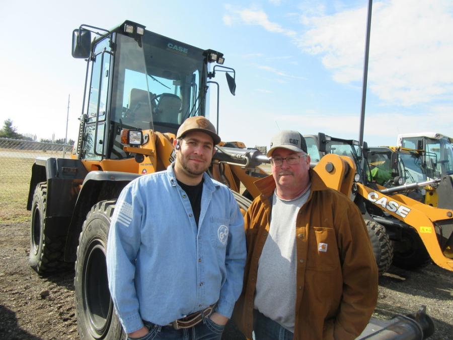 Austin (L) and Bill Woronka  of Father & Son Property Maintenance were at the auction in search of equipment bargains.