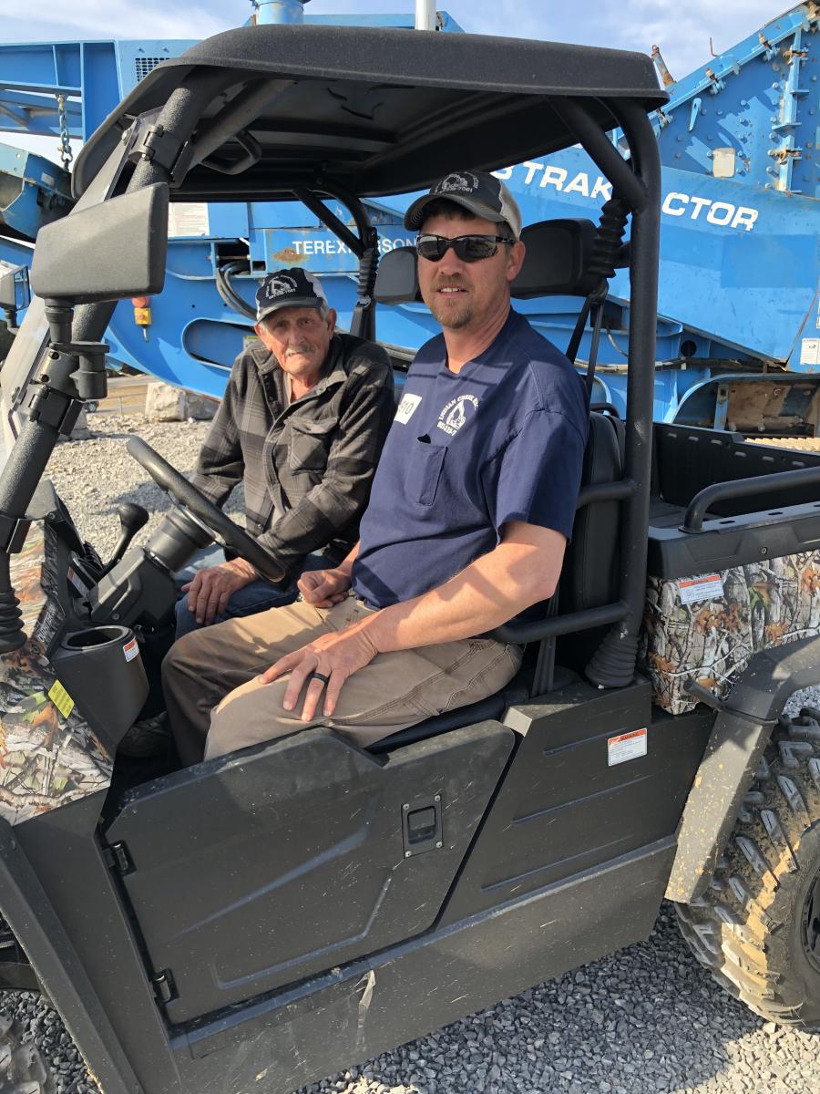 Larry (L) and Kem Leftwich, of Indian Creek Excavation in Buffalo Valley, Tenn., looked at the Powerscreen 428 Trackpactor and planned to bid on it.