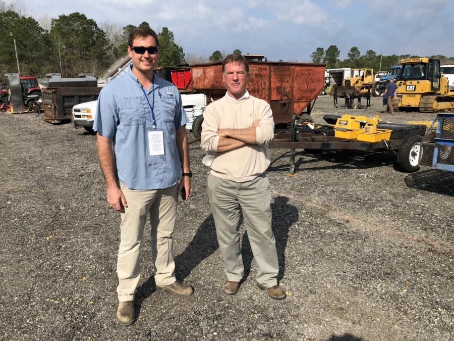 Chris McIntosh (L) of Port City Machinery in Charleston, S.C., and Rich Kelly of WorldNet Auctions catch up before the auction begins.