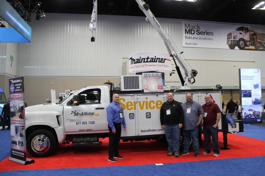 (L-R): Kory Jacobsma, inside sales manager of Maintainer Corp. of Iowa in Sheldon, Iowa, with a service truck for MacAllister CAT of Indianapolis, Ind. Brian McNeal, Eric Bowman and Joe Roller, all of McAllister CAT’s service crew, were on hand. 