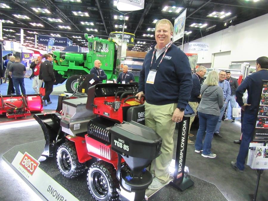 At the BOSS Snowplow booth, Ty Steinbrecher shows the new BOSS Snowrator.