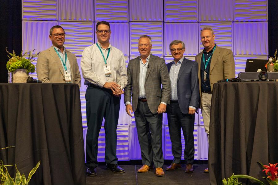 Highway Equipment & Supply Co. accepts the 2021 Dealer of the Year award at the Volvo CE dealer conference in Arizona in March. (L-R) are Ryan Flood, Vince Pagano (Highway Equipment), Stephen Roy, Agako Nouch and Jeff Bryant (Volvo CE).