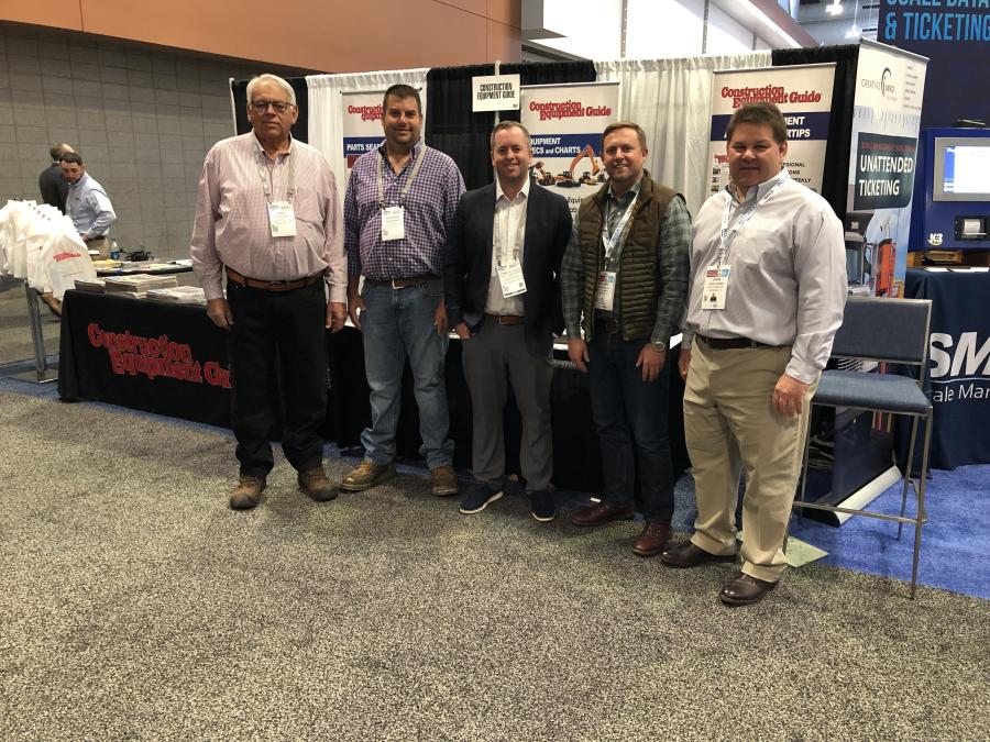 Stopping by the Construction Equipment Guide (CEG) booth with Teddy McKeon (C) of CEG, (L-R) are Rick and Richard Sowers of Sowers Construction Company in Mt. Airy, N.C.; and Richard Luck and John Legore, both of Luck Companies in Richmond, Va.