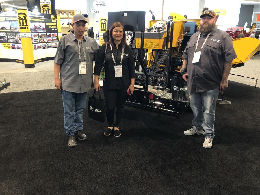 (L): Steven Hughes, Marie Gorman and Justin Bittiker, all of K.C. Construction & Pavement in Kanas City, Mo., check out the Mauldin 1360 paver. 