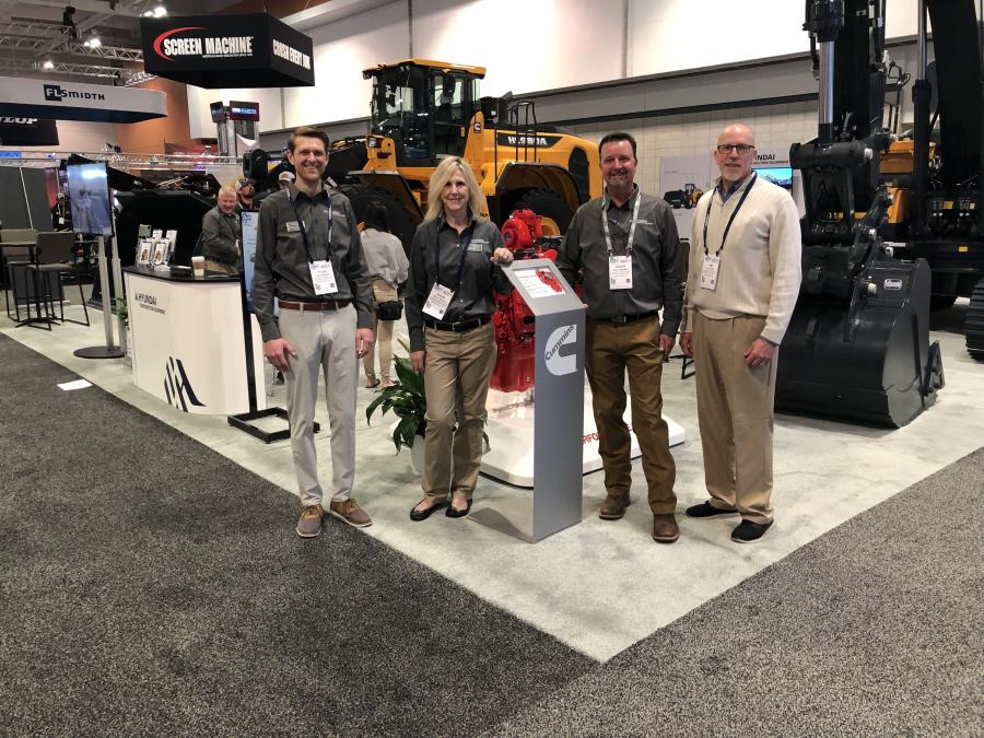 The Hyundai booth featured the HL 980A wheel loader and HX220AL excavator. (L-R) are Tyler Anderson, Susan Philpott and Shawn Galligan, all of Hyundai, and Tim Gerbus of Taylor Construction Equipment.