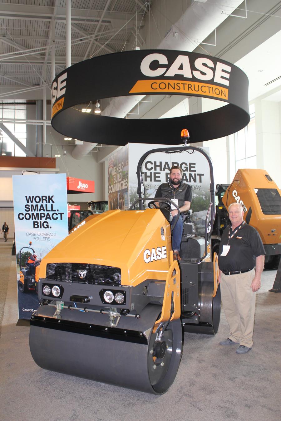 Nathaniel Waldschmidt (in operator’s seat),  product manager-excavators, and Rob Manthei, both of Case, discuss the DV45E E Series compact DV vibratory rollers.